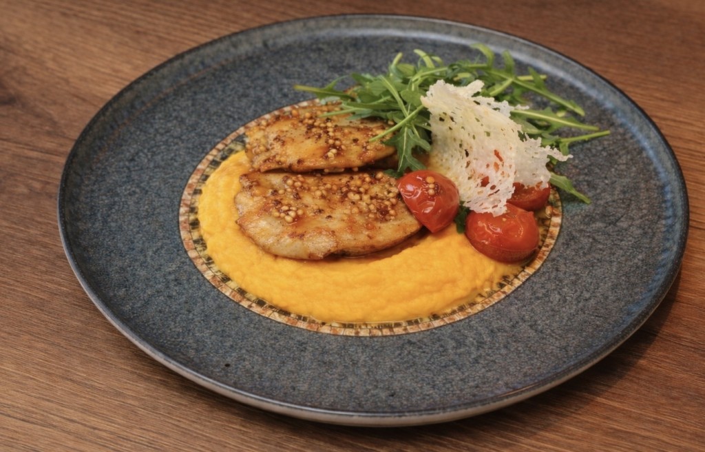 Chicken fillet on celery and carrot purée